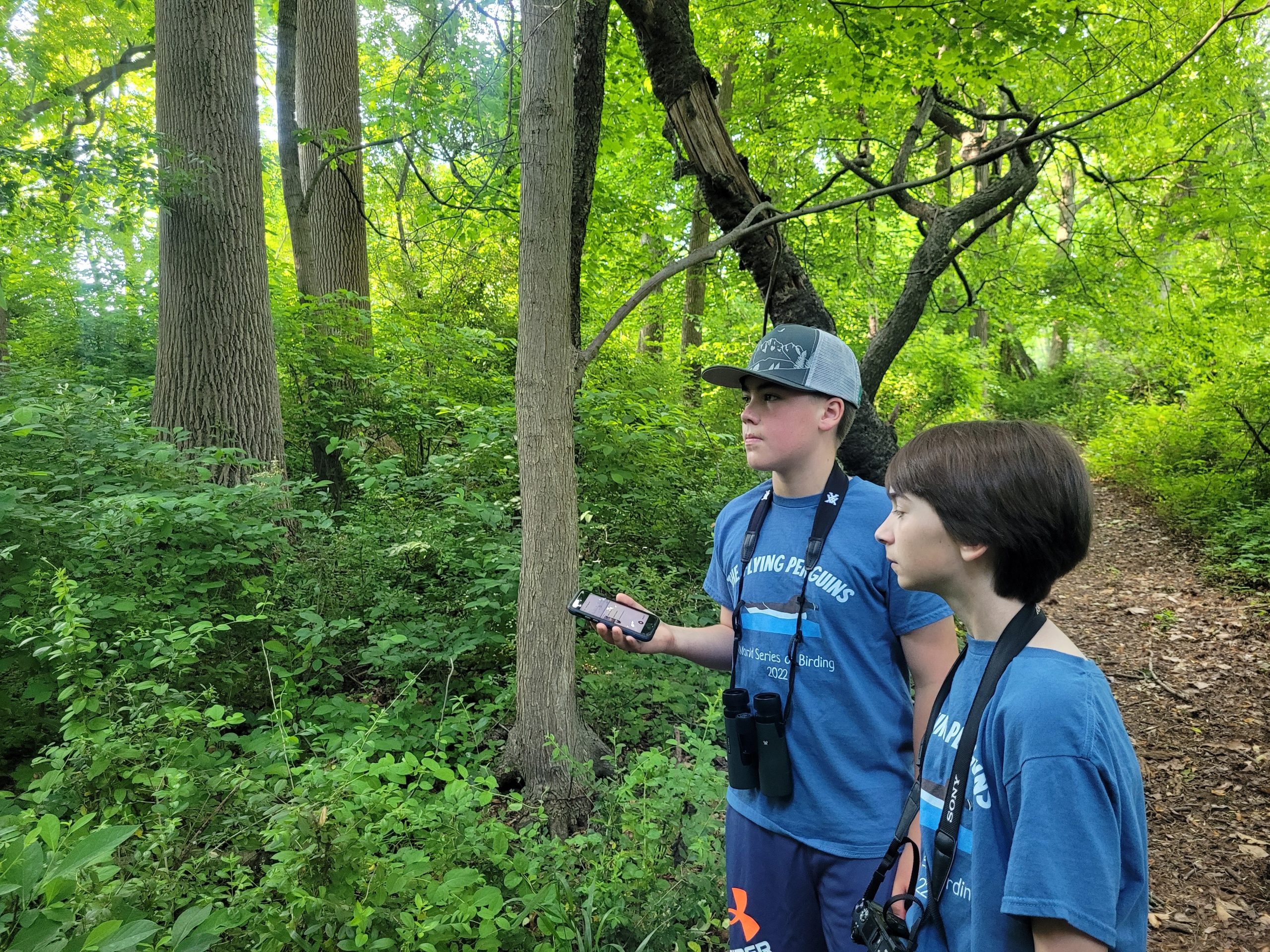 Christian and Hudson Recording Bird Songs for Identification Using the Merlin App - Photography by Christi Leeson