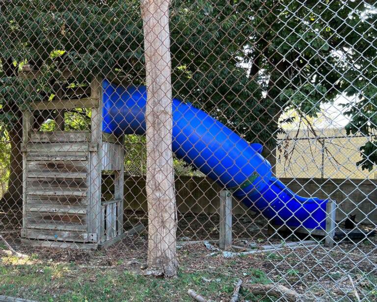 Slide in playground behind The Learning Center on Madison Ave. - one of the 27 lots this project is transforming into community gardens.